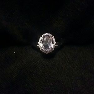 Light Tanzanite With White Topaz On Irodium